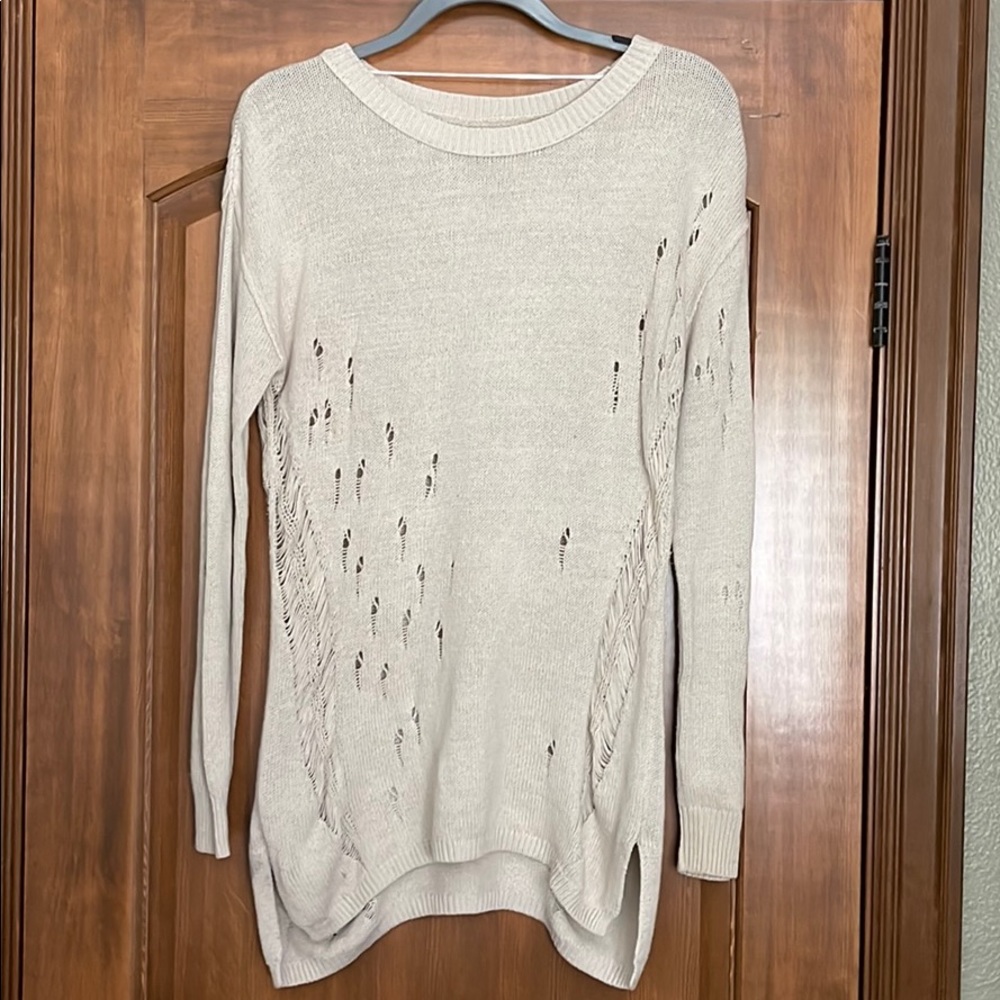 Distressed tan sweater